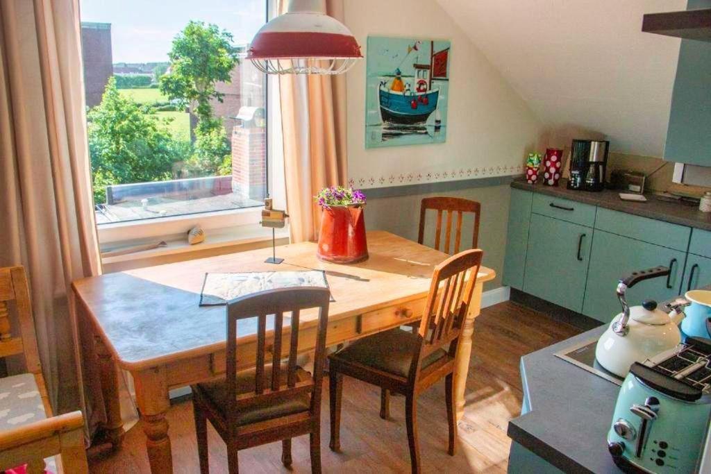 Bunte-Kuh-Borkum Apartment Bagian luar foto